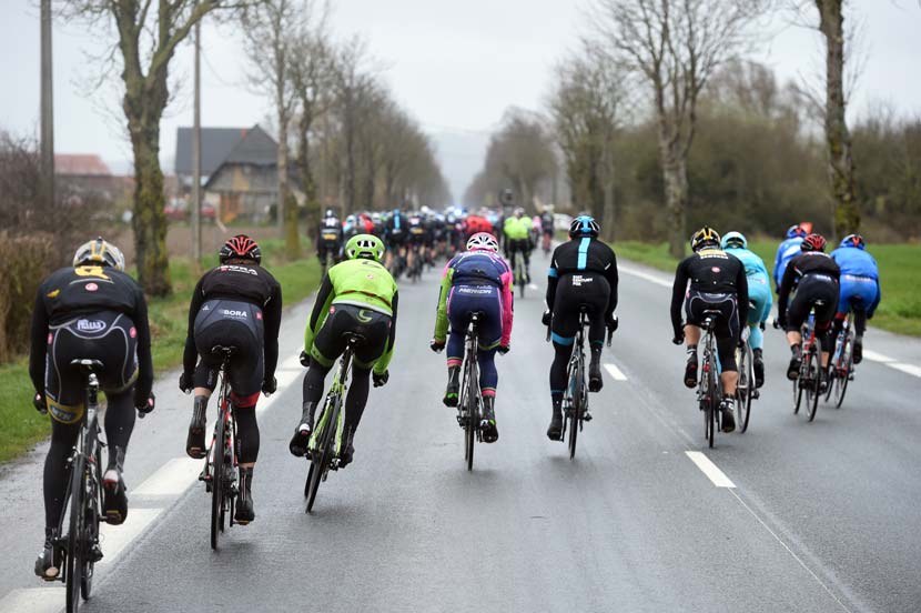 Riders struggle to hold their bikes upright in ±100km/h winds. Photo: Graham Watson