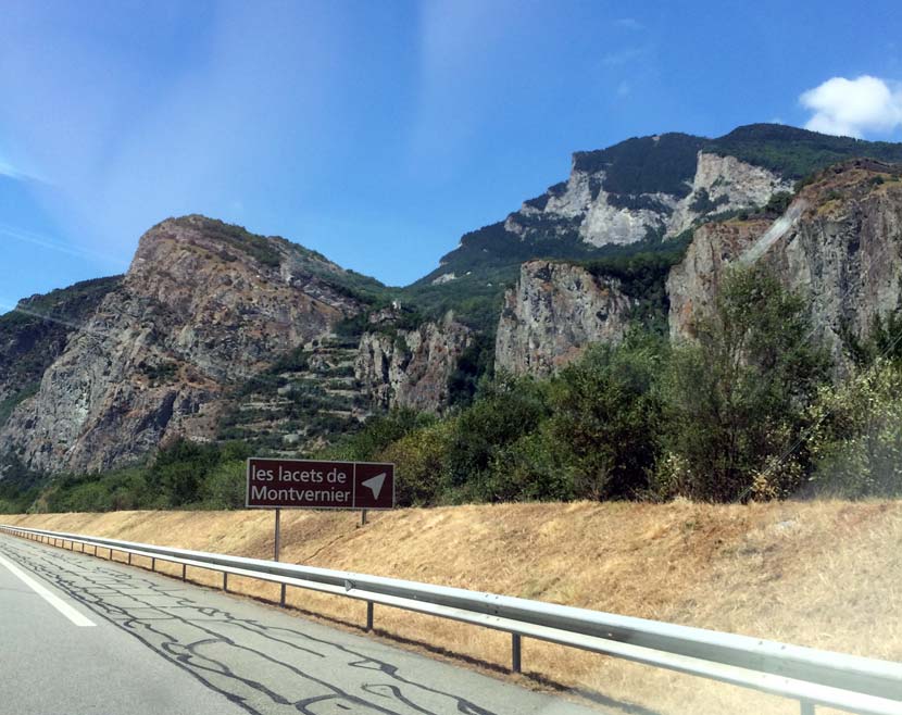 Behind the sign is the climb... but it doesn't stand out too much from the A43 autoroute.  Photo: François Thomazeau