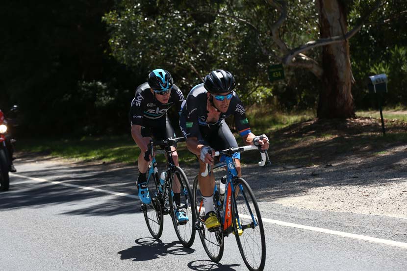 Joe Cooper ahead of Chris Froome in the final stage of the Jayco-Herald Sun Tour. Photo: Con Chronis