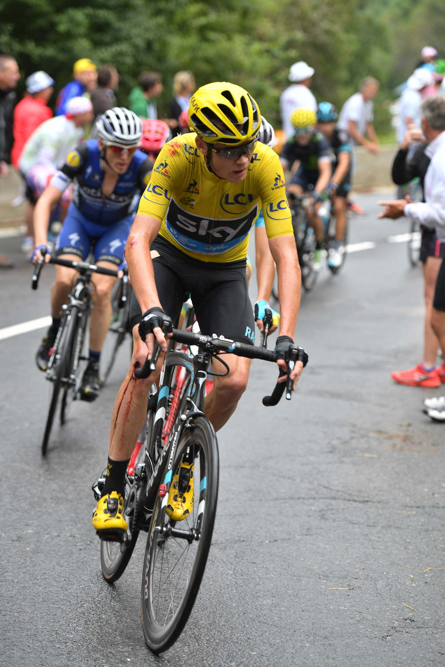 Even the race leader crashed heavily in stage 19 – but he quickly took a bike from team-mate Geraint Thomas and made it to the finish safely. Photo: Graham Watson